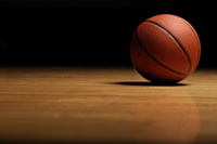 Basketball on empty court